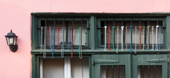 Mardi Gras Beads on Window Bar